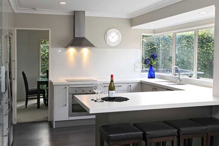 A chunky white stone bench | Jag Kitchens