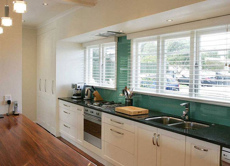 Aqua coloured wall in a kitchen | Jag Kitchens